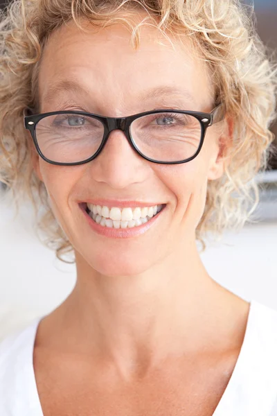 Portrait of mature woman relaxing at home