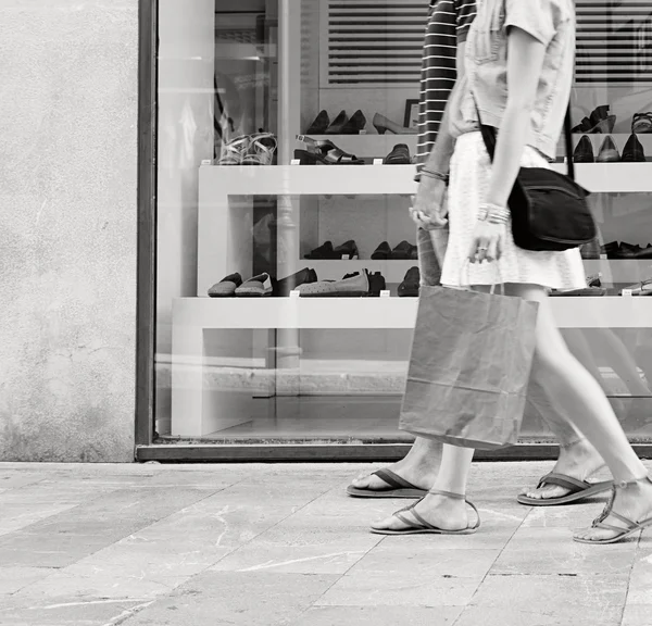 Couple walking with shopping bags