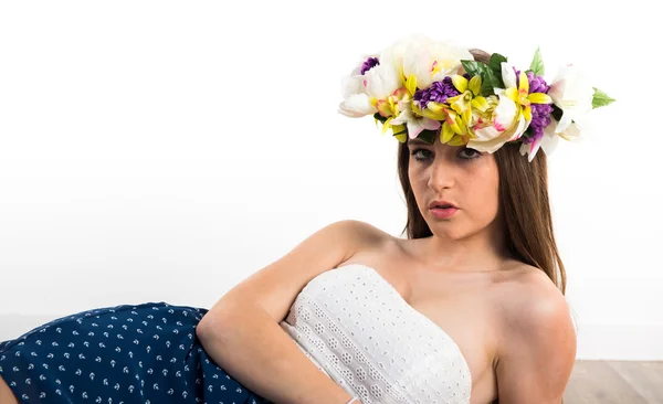 Model woman with crown of flowers