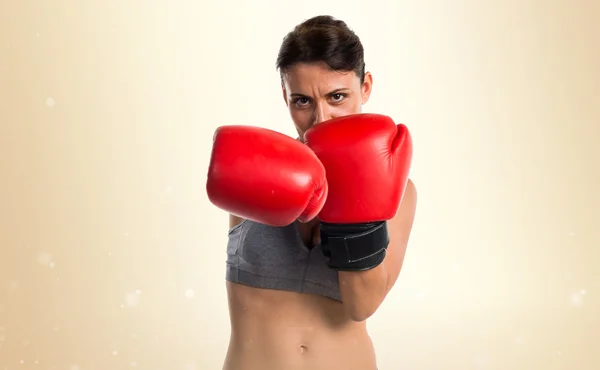 Sport woman with boxing gloves