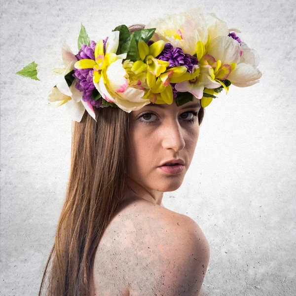 Model woman with crown of flowers