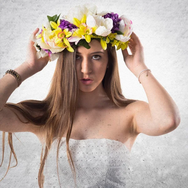 Model woman with crown of flowers