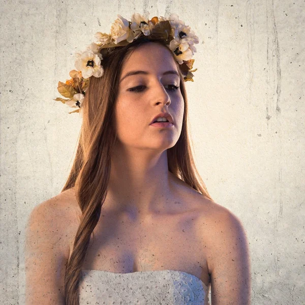 Model woman with crown of flowers