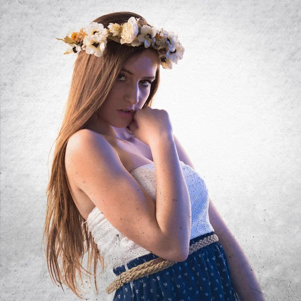 Model woman with crown of flowers