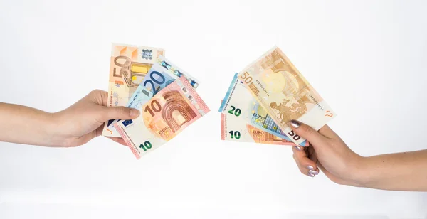 Hands holding euro money bills banknotes