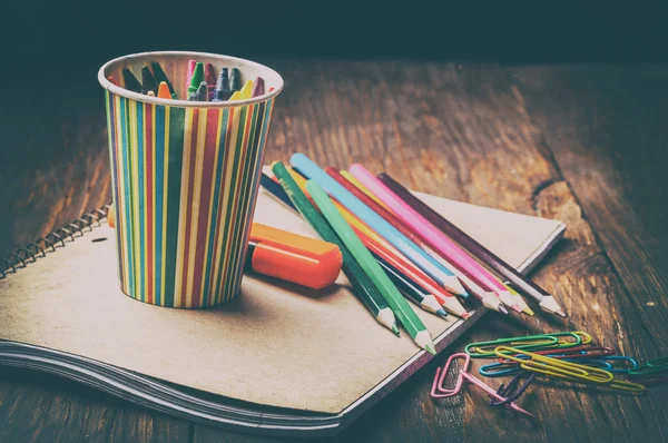 Retro colored pencils and paper clips