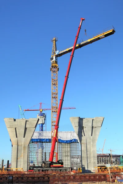 Setting tower crane in construction site