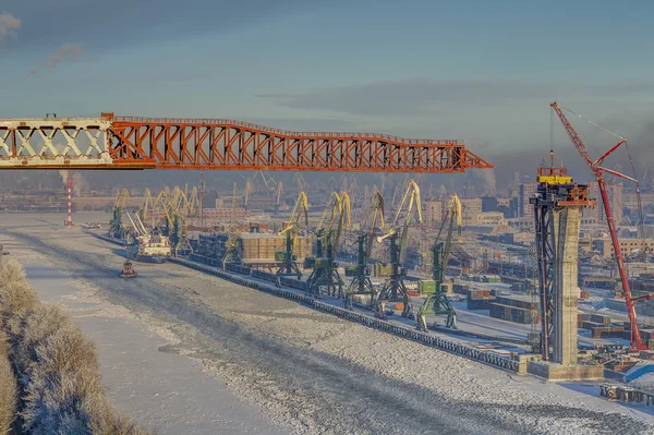 Sea channel and cargo port, Saint-Petersburg, Russia, winter, top view.