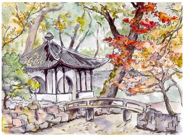 Chinese garden with bridge and pagoda pavilion in Suzhou , China