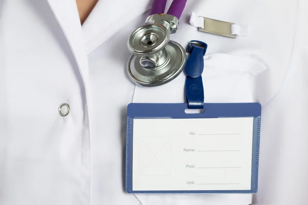 Close up view of medical doctor chest with clipped blank badge