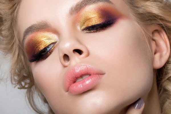 Close up beauty portrait of young woman with summer makeup