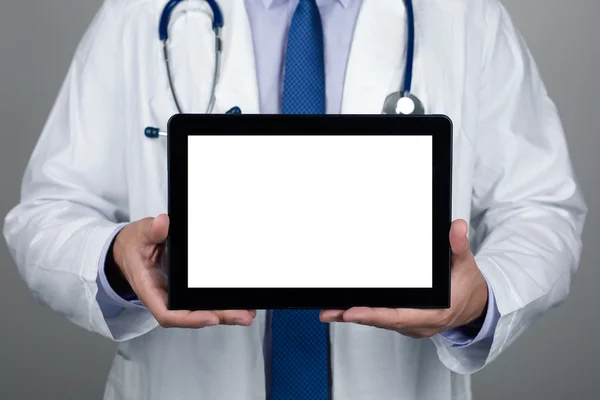 Close up view of doctor showing blank digital tablet