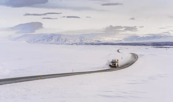 Snowplow Clearing the Ring Road