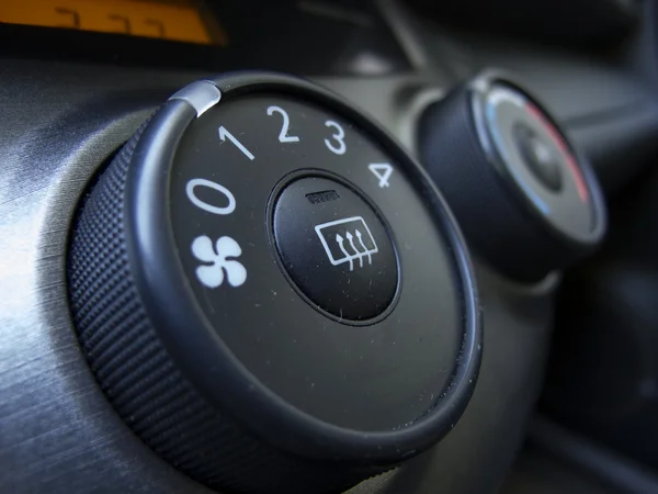 Close-up of car  button.