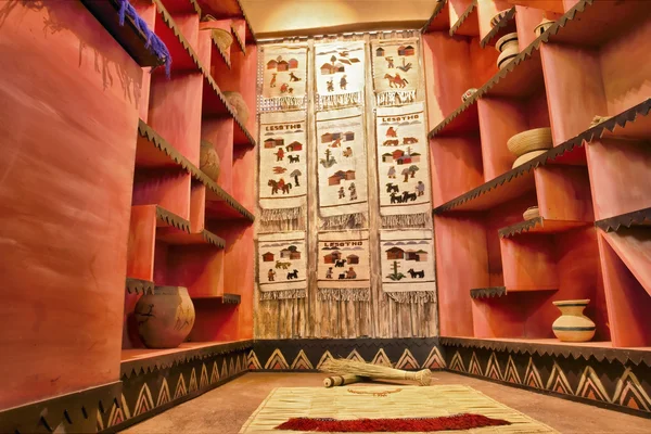 Red room with samples of traditional craft
