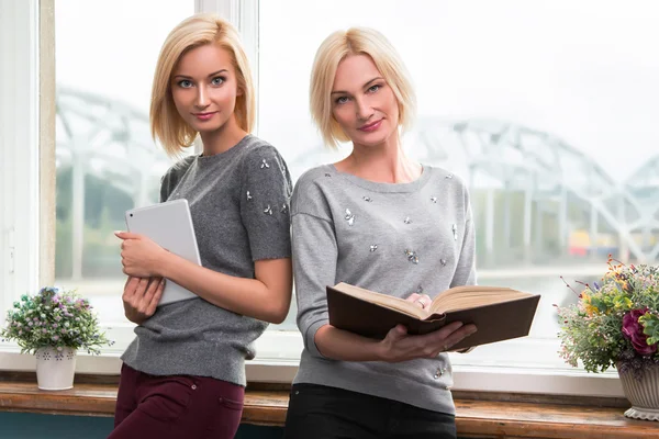 Mother and daughter reading