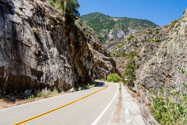 Two Lane Road Through Granite Rock King\'s Canyon California