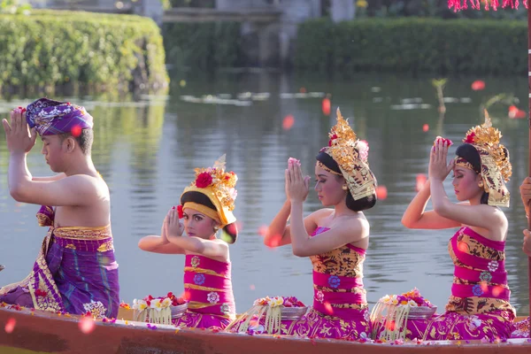 Beratan Lake, Bali, Indonesia, June 16 2015 : Balinese villagers participating in traditional religious Hindu procession in Ulun Danu temple Beratan Lake in Bali, Indonesia, June 16 2015