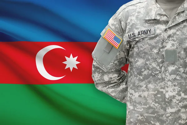 American soldier with flag on background - Azerbaijan