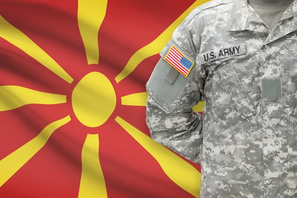 American soldier with flag on background - Republic of Macedonia