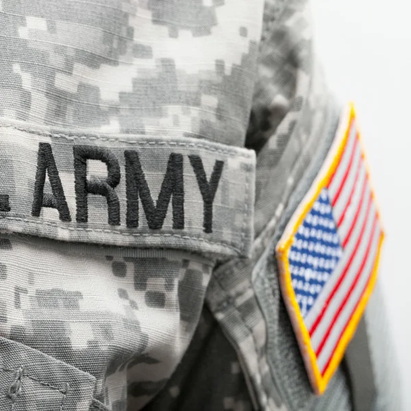 USA flag and U.S. Army patch on solder's uniform