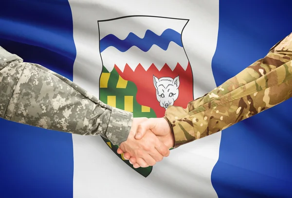 Military handshake and Canadian province flag - Northwest Territories