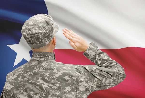 Soldier saluting to US state flag series - Texas