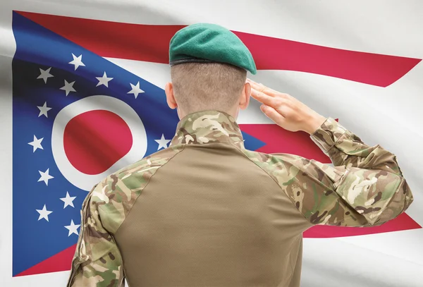 Soldier saluting to USA state flag conceptual series - Ohio