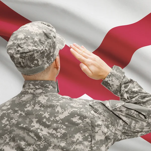 Soldier saluting to US state flag series - Alabama