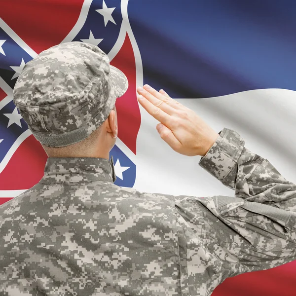 Soldier saluting to US state flag series - Mississippi