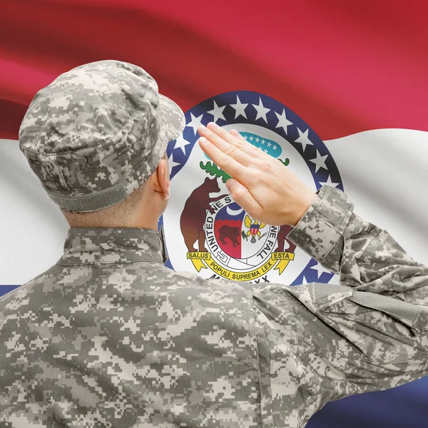 Soldier saluting to US state flag series - Missouri