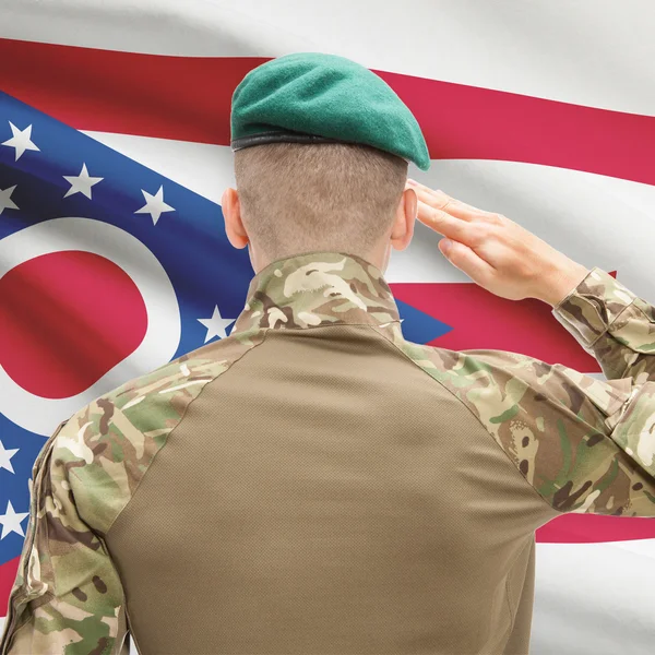 Soldier saluting to USA state flag conceptual series - Ohio