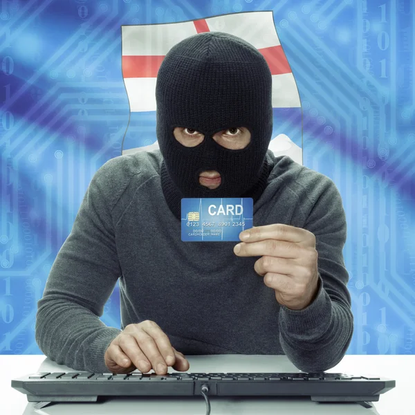 Dark-skinned hacker with Canadian province flag on background holding card - Alberta