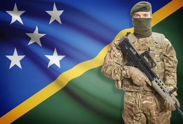 Soldier holding machine gun with flag on background series - Solomon Islands