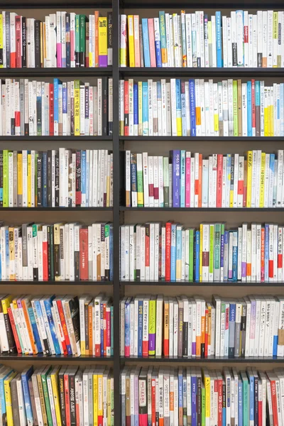 SEOUL, KOREA - AUGUST 13, 2015: Bookshelves with lots of books in bookstore of COEX convention and exhibition center on August 13, 2015 in Seoul, South Korea