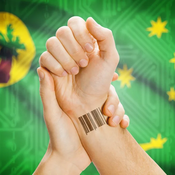 Barcode ID number on wrist and national flag on background series - Cocos (Keeling) Islands