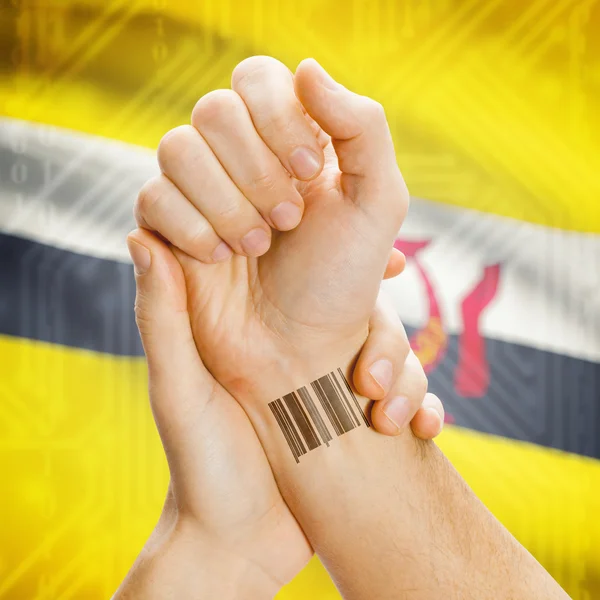 Barcode ID number on wrist and national flag on background series - Brunei