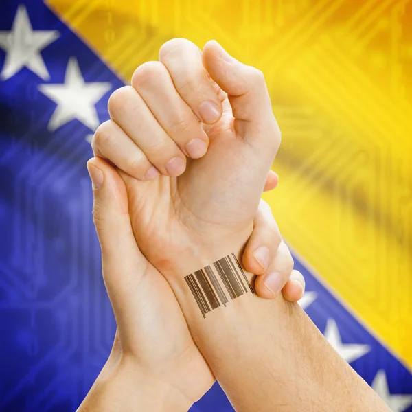 Barcode ID number on wrist and national flag on background series - Bosnia and Herzegovina