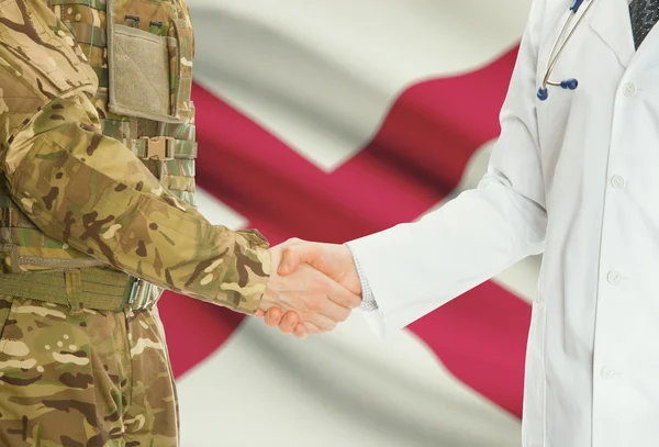 Military man in uniform and doctor shaking hands with US states flags on background - Alabama