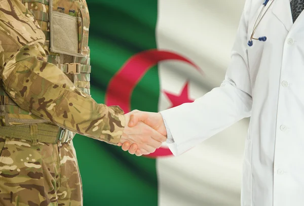 Military man in uniform and doctor shaking hands with national flag on background - Algeria