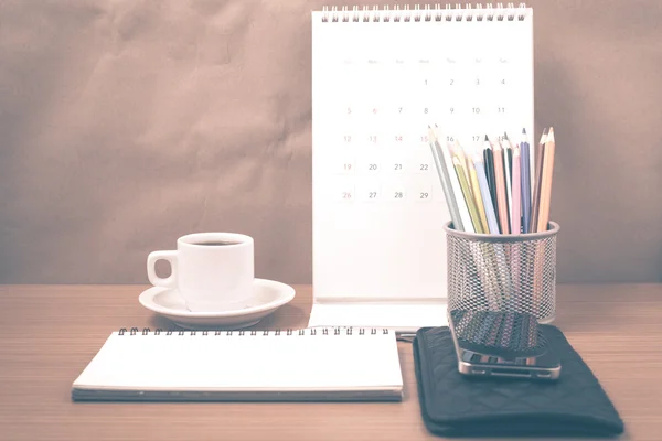 Office desk : coffee with phone,wallet,calendar,color pencil box