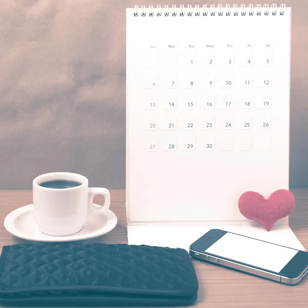 Office desk : coffee with phone,wallet,calendar,heart vintage st
