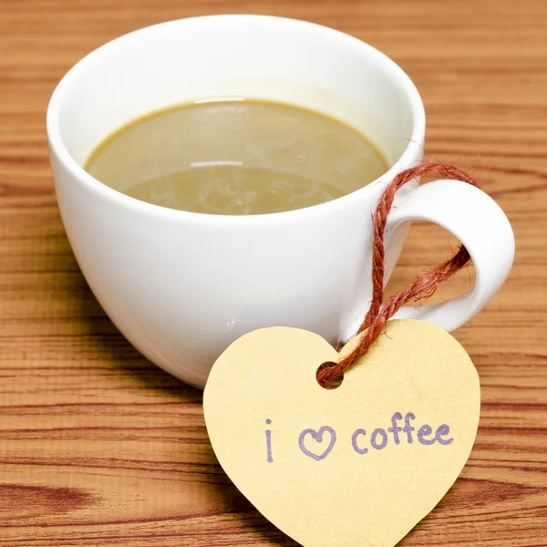 Coffee cup with heart tag write I love coffee word