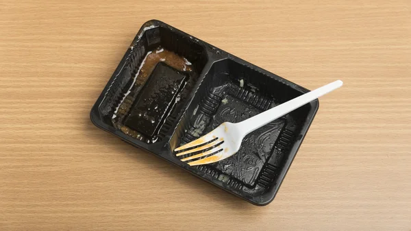 Dirty plastic food container