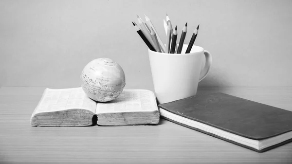 Book and earth ball with color pencil black and white color tone