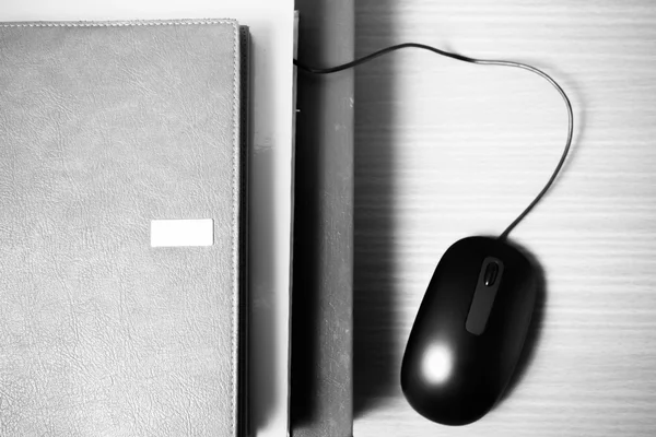 Book and computer mouse black and white color tone style