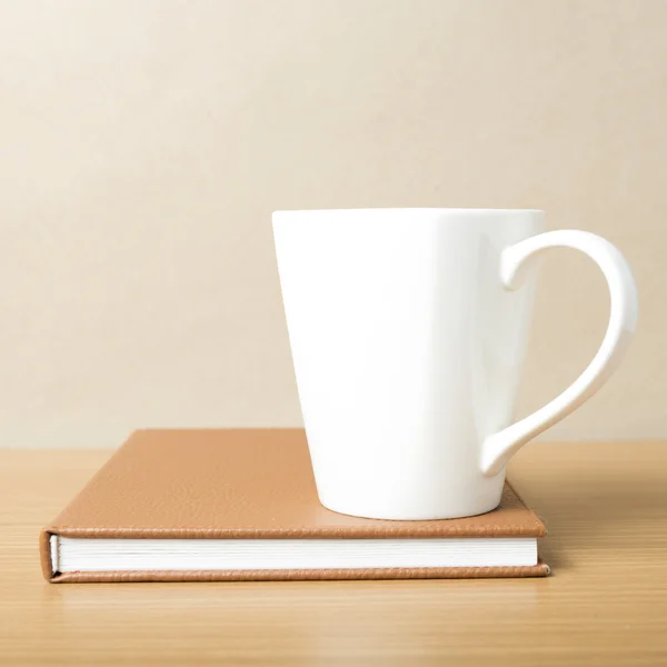 Book and coffee mug