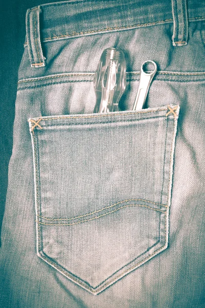 Screwdriver in jean retro vintage style