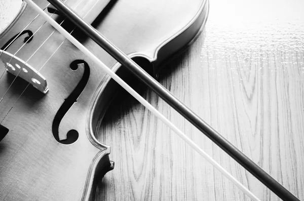Violin on wood background black and white color tone style