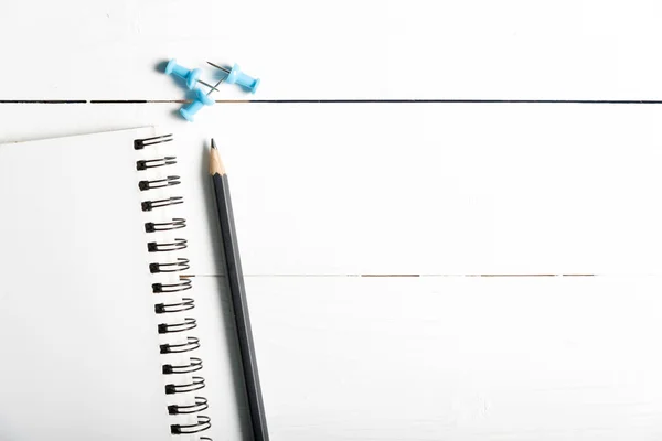 Pencil and notepad with push pin